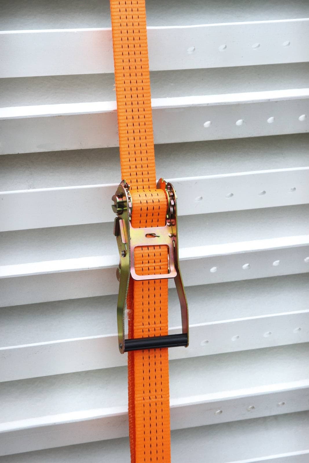 Pas transportowy 12m x 50mm z napinaczem 4000 kg pomarańczowy Kerbl